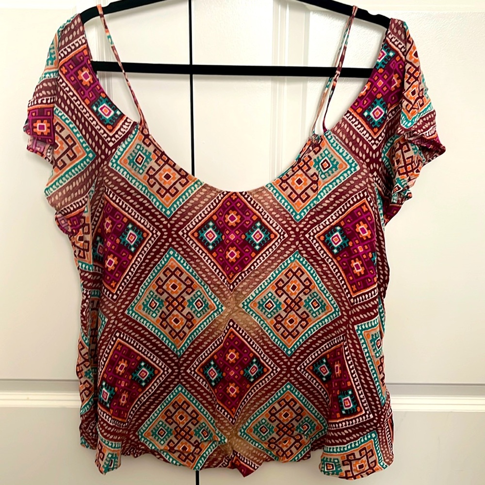 Patterned off the shoulder top. Size L. Forever 21.